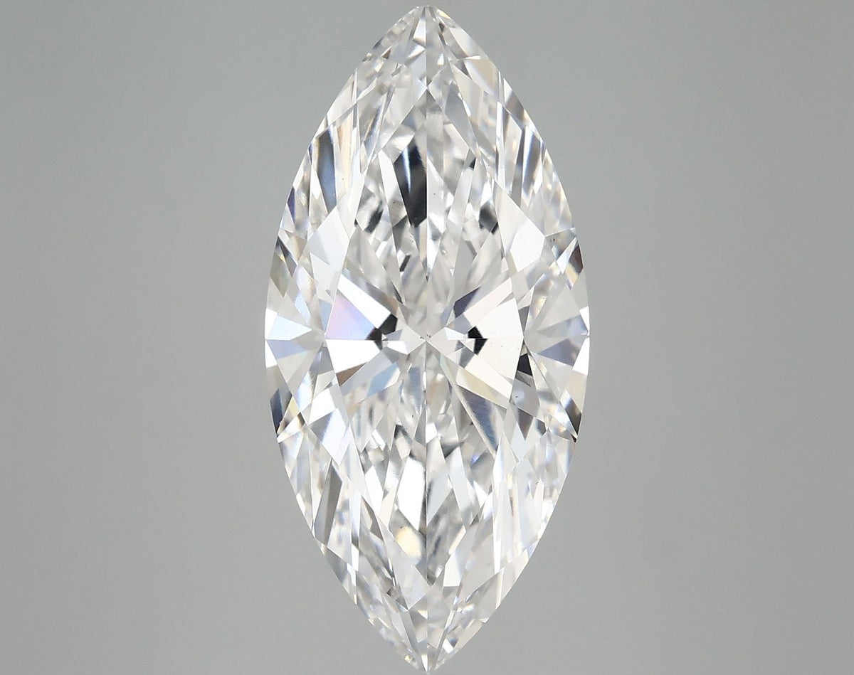Marquise cut diamond gemstone with brilliant facets on a light gray background