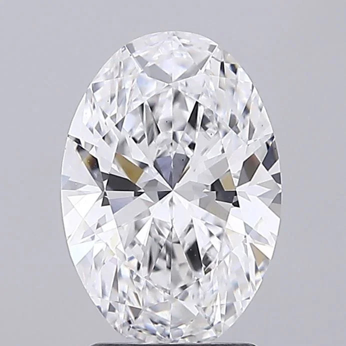 Oval cut diamond loose stone with brilliant facets on a light gray background