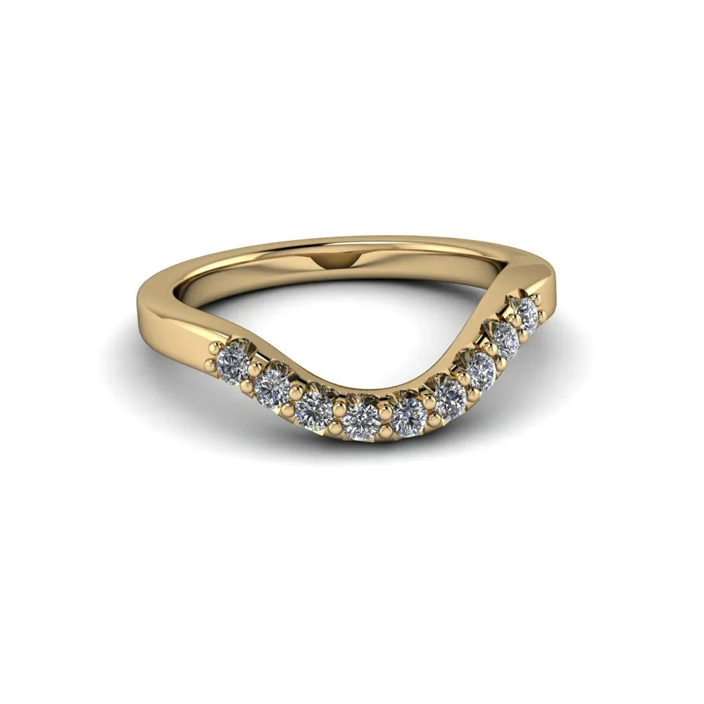 Curved yellow gold ring with round diamonds in a chevron setting