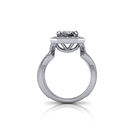 Side view of custom white gold engagement ring with round center diamond and pave band
