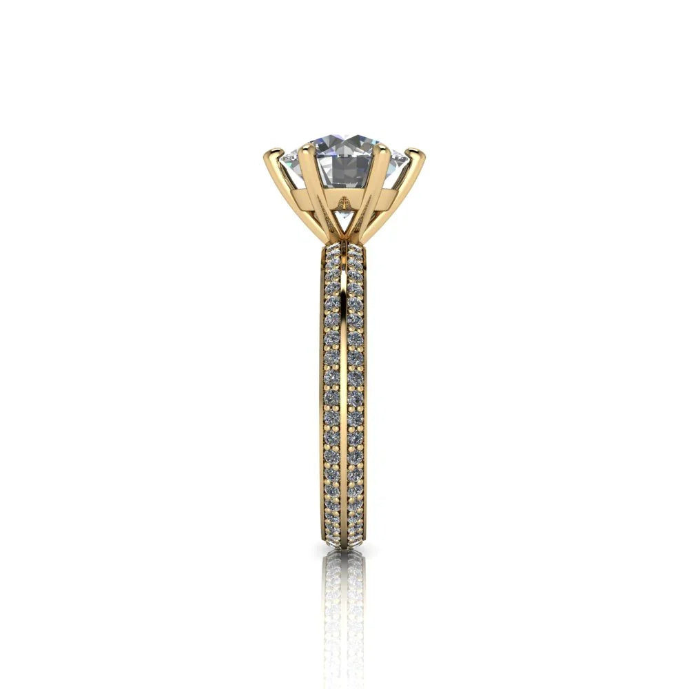 Yellow gold solitaire engagement ring with pavé diamond band, side view