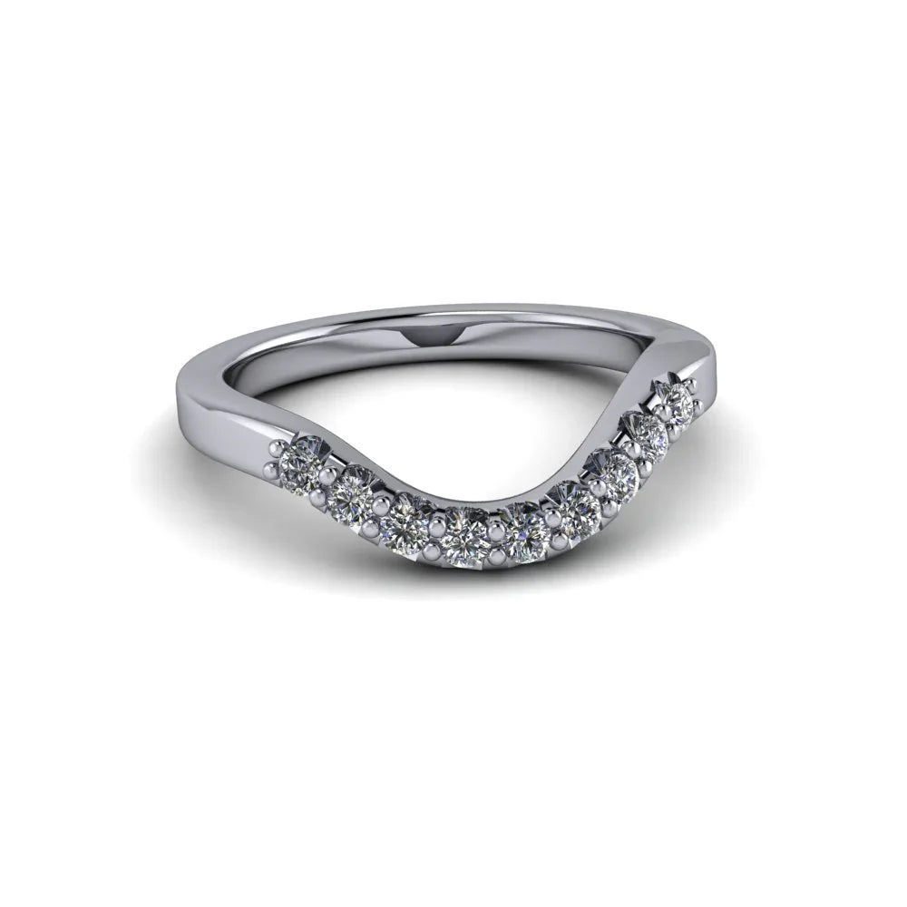 Curved diamond wedding band in white gold with pavé set round diamonds