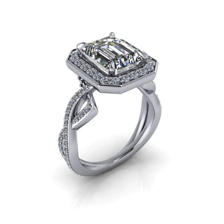 Emerald cut diamond engagement ring with halo setting and intricate pavé band