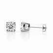 Cushion cut lab grown diamond stud earrings set in white gold on white background
