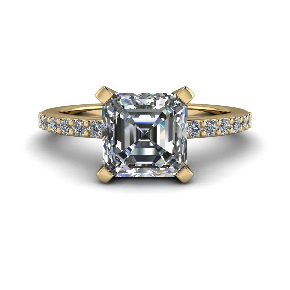 Asscher cut diamond engagement ring with yellow gold band and pavé side stones