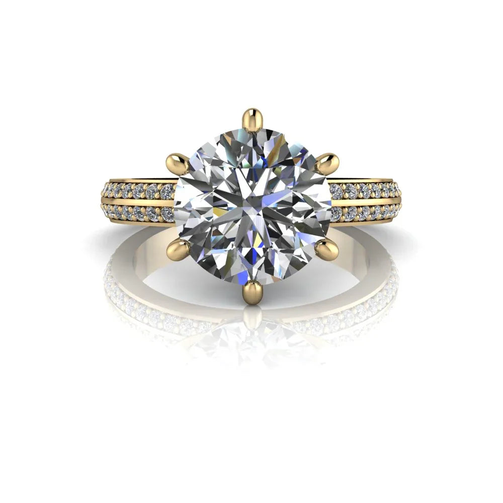 Yellow gold engagement ring with large round center diamond and pavé diamond band