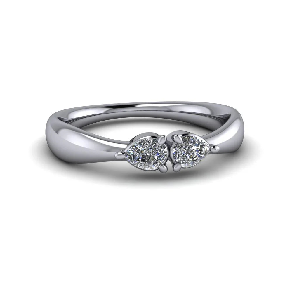 Custom white gold ring with two pear-shaped diamonds in a unique modern setting