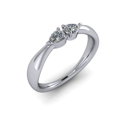 Custom white gold ring with two pear-cut diamonds, modern engagement jewelry