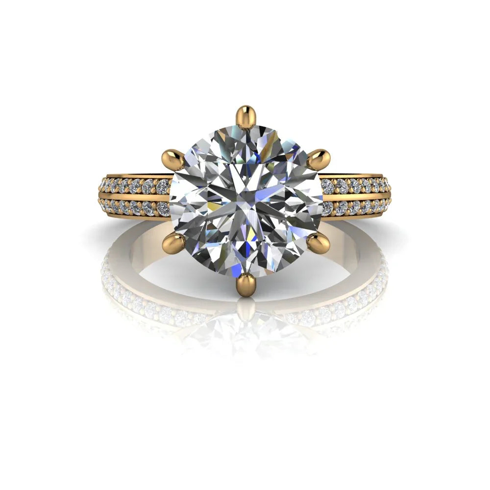 Yellow gold engagement ring with round solitaire diamond and pavé band detail