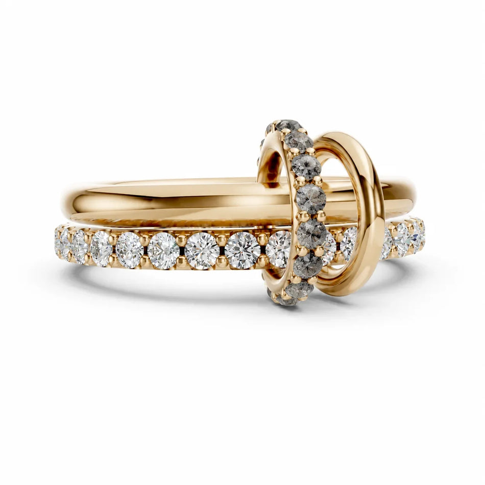 Elegant gold engagement ring with diamond accents and intertwined bands