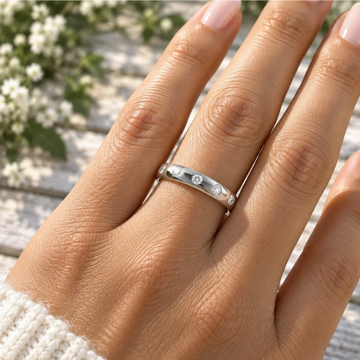 Bel Viaggio Designs flush set lab diamond wedding band on a hand