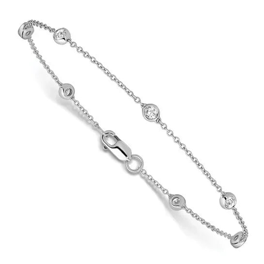 Delicate white gold bracelet with bezel-set round diamonds and lobster clasp