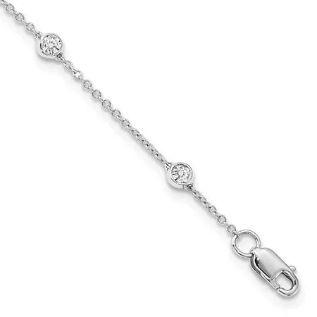 Delicate white gold bracelet with bezel-set round diamonds and lobster clasp