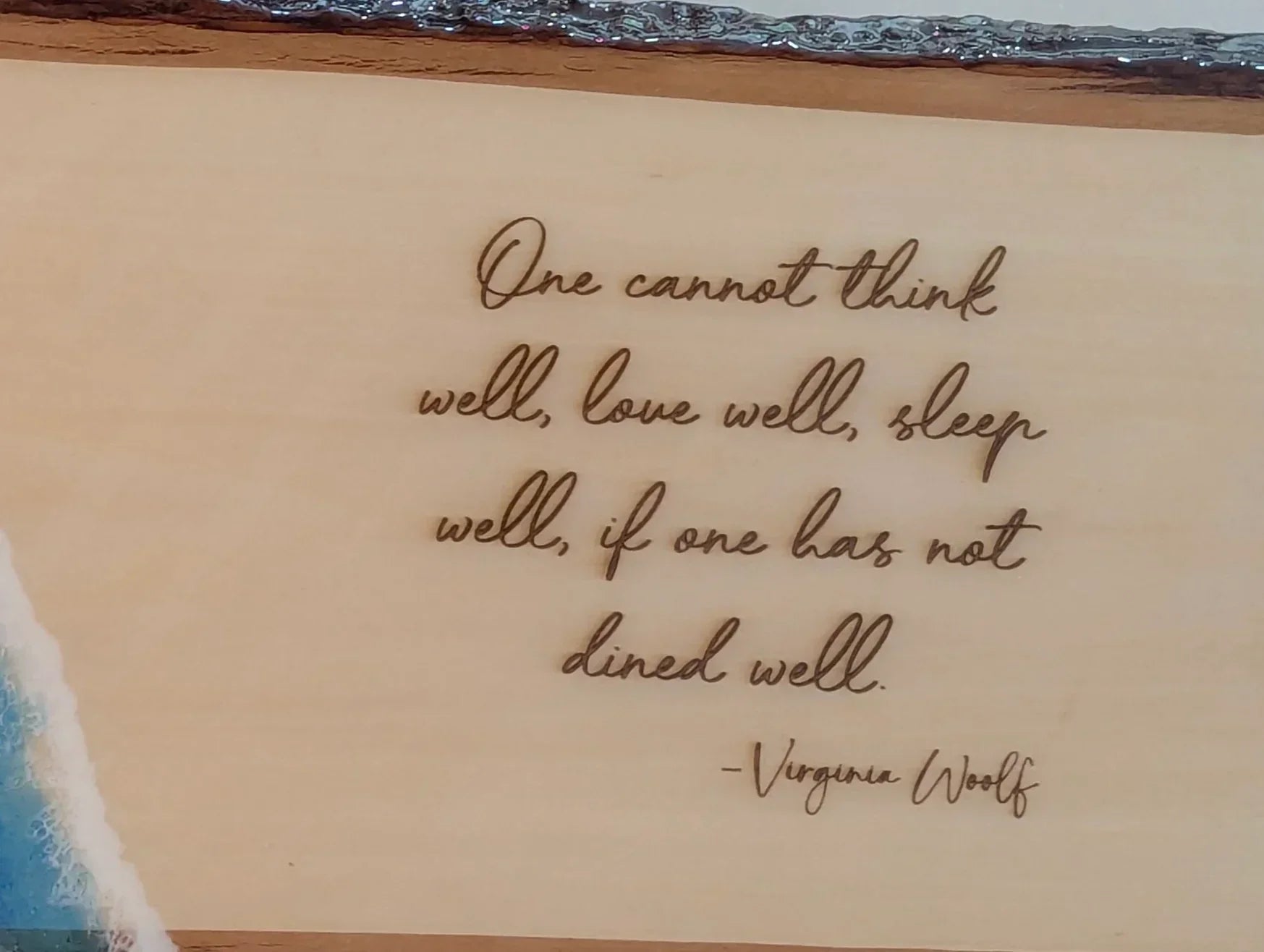 Engraved wood plaque with Virginia Woolf dining quote and blue resin corner accent