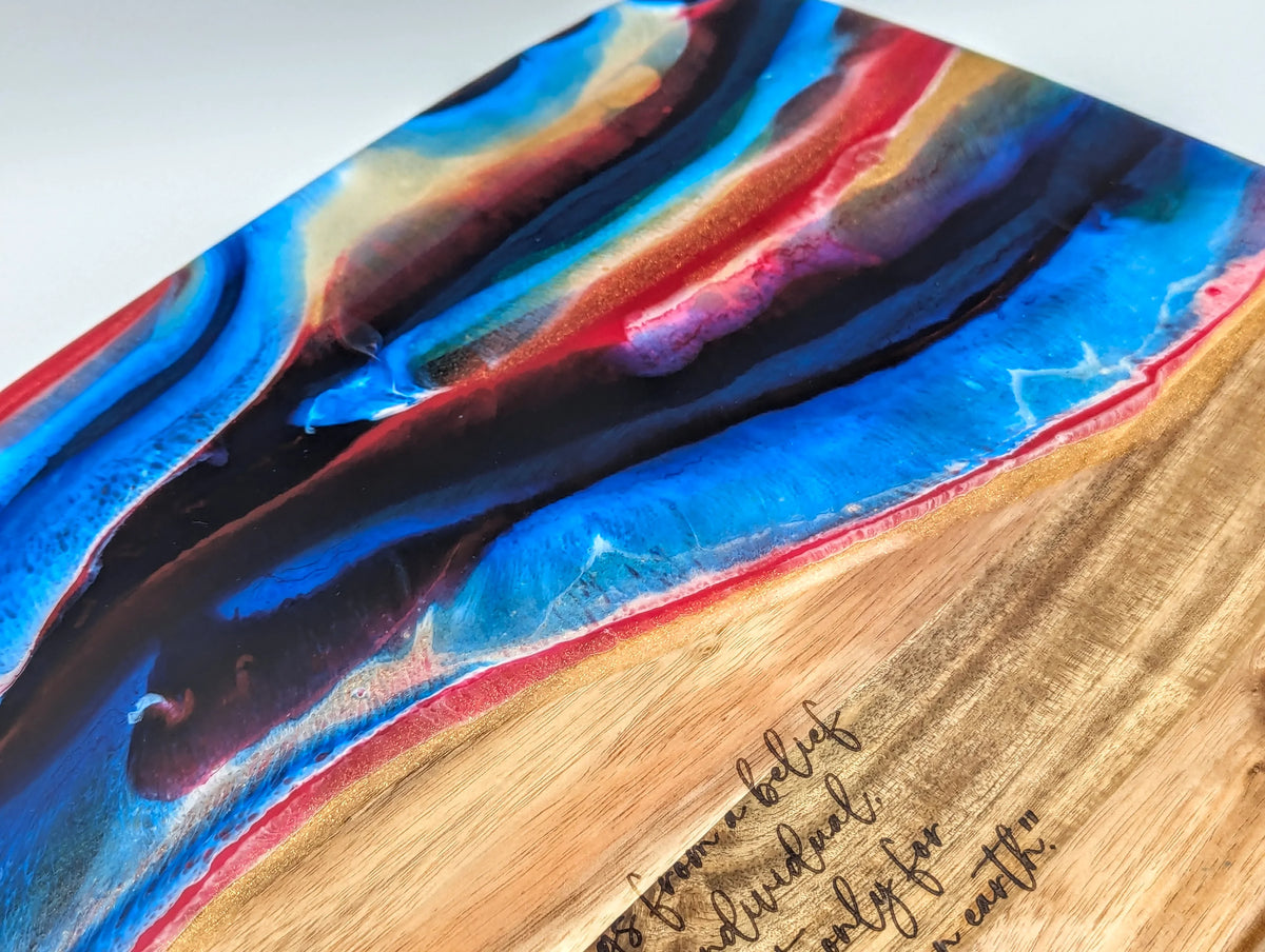 Colorful epoxy resin and wood serving board with handwritten engraved quote