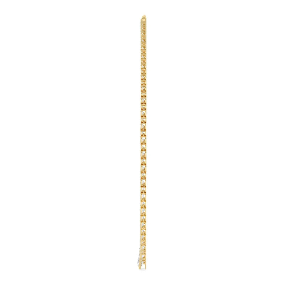 Elegant gold bracelet with sparkling diamonds, perfect for custom engagement or bespoke jewelry designs.