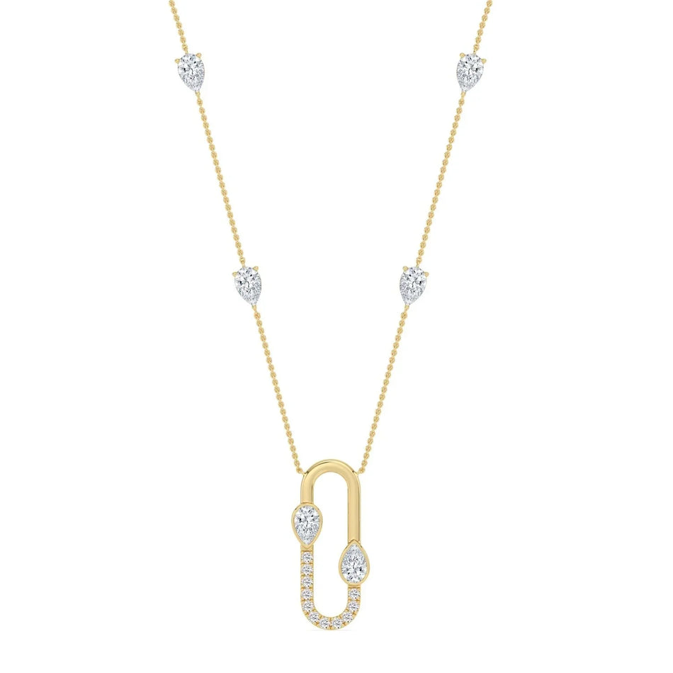 Elegant gold necklace with pear-cut diamonds and a linked pendant design