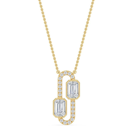 Elegant gold necklace with two emerald-cut diamonds and diamond accents, perfect for custom engagement jewelry.