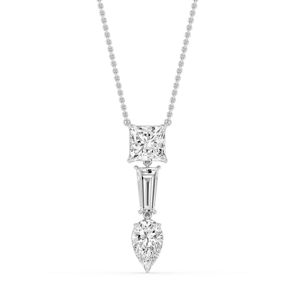 Elegant three-stone diamond pendant with princess, baguette, and pear cuts on chain