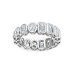 White gold eternity band with alternating round and emerald cut diamonds