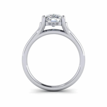 Custom white gold engagement ring with round center diamond and side accent stones