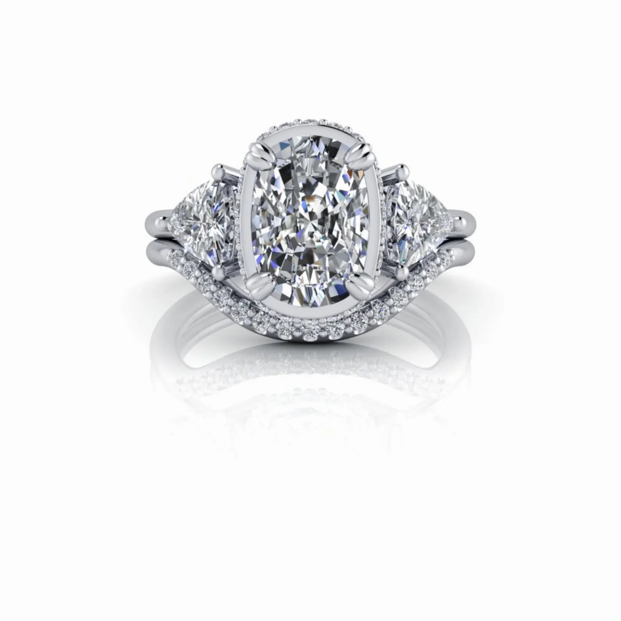 Oval diamond engagement ring with side stones and pavé band on white background