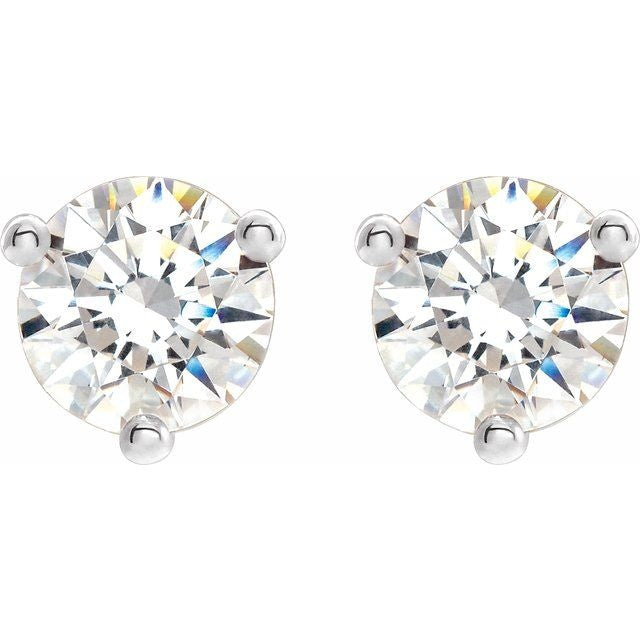 Round diamond stud earrings in four-prong white gold settings