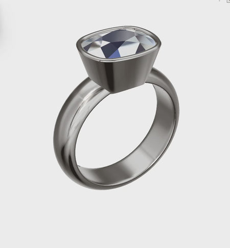 a ring with a diamond on top of it