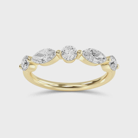 a three stone diamond ring on a white background