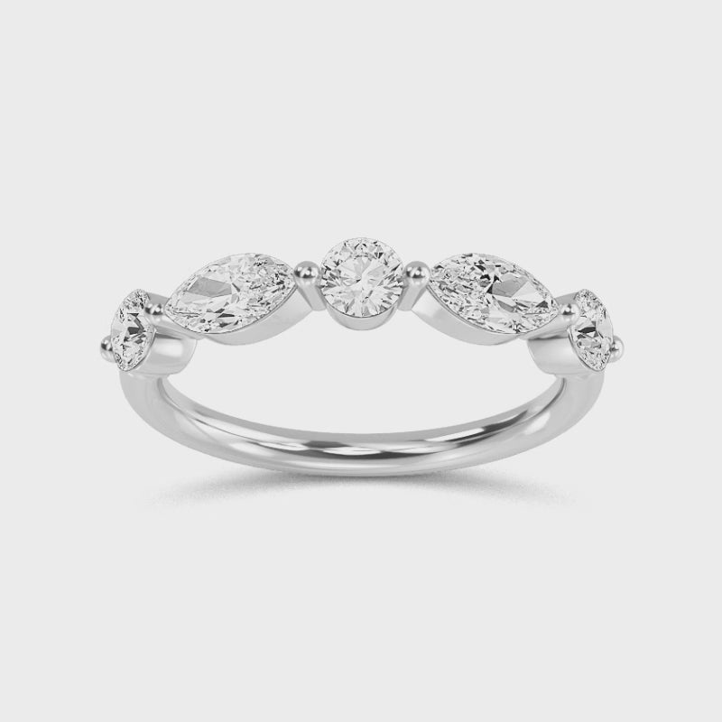 a white gold wedding ring with diamonds