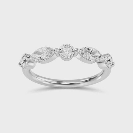 a white gold wedding ring with diamonds