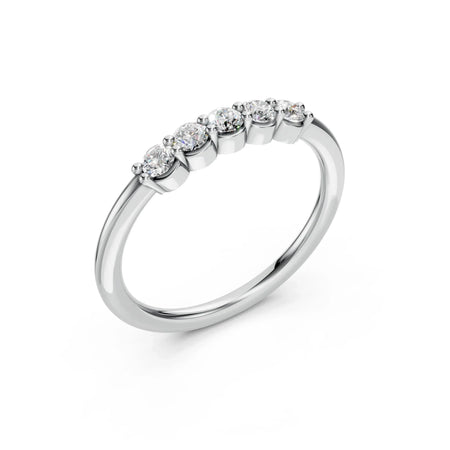 White gold band with five round-cut diamonds in a row, custom engagement ring