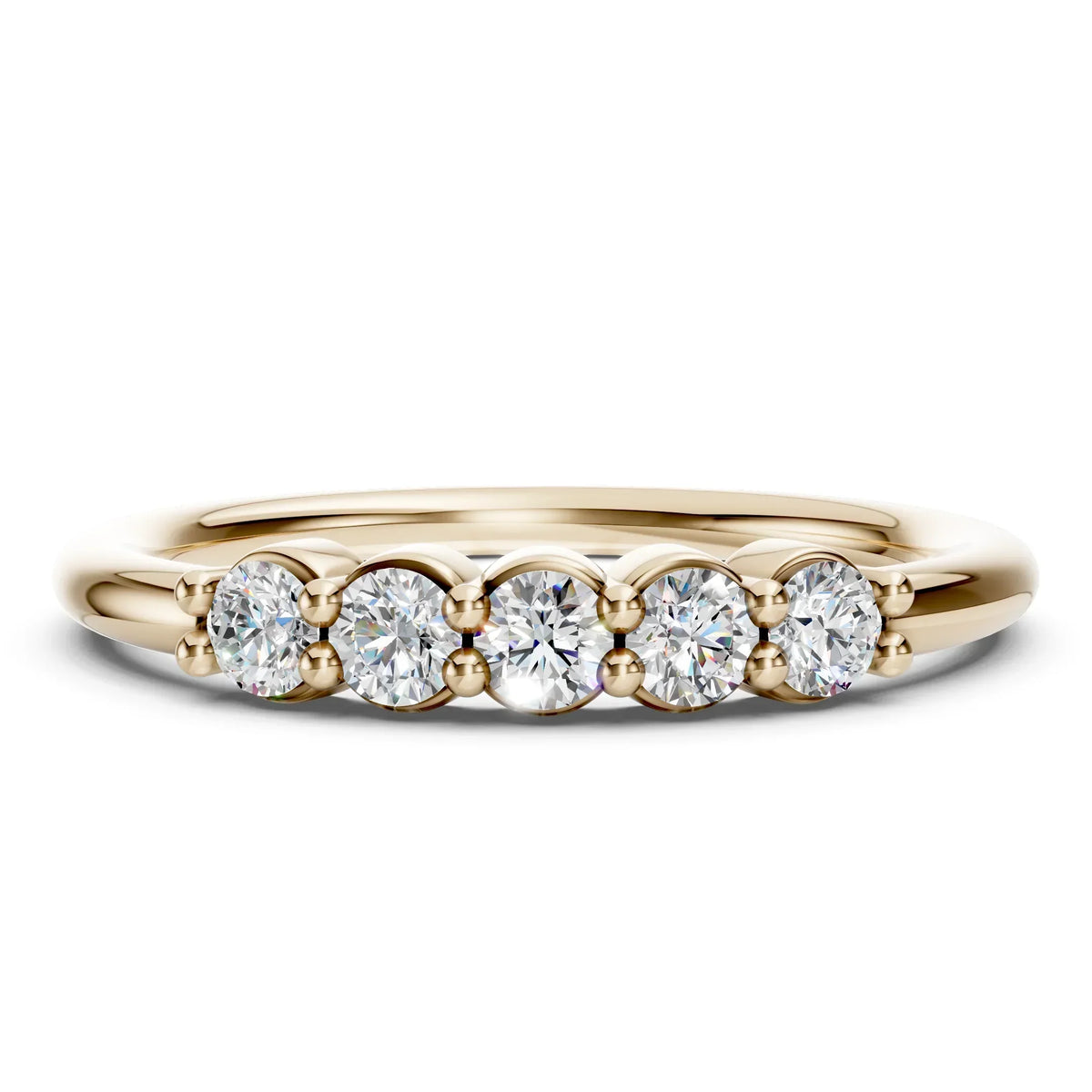 Yellow gold ring with five round diamonds in a row, custom fine jewelry design