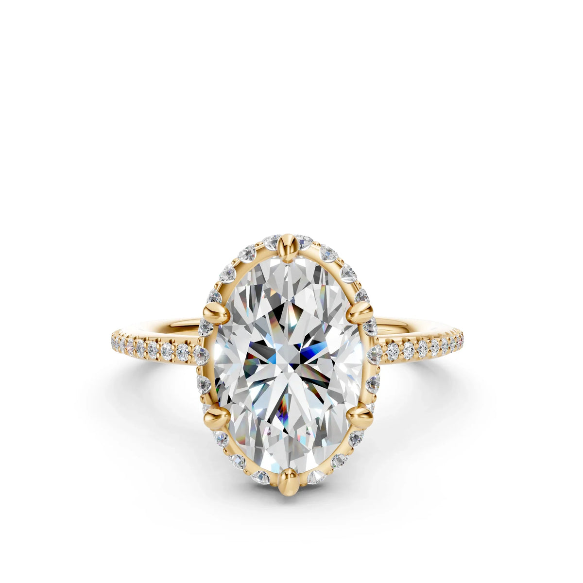 Oval diamond halo engagement ring with gold band and pavé-set accent stones