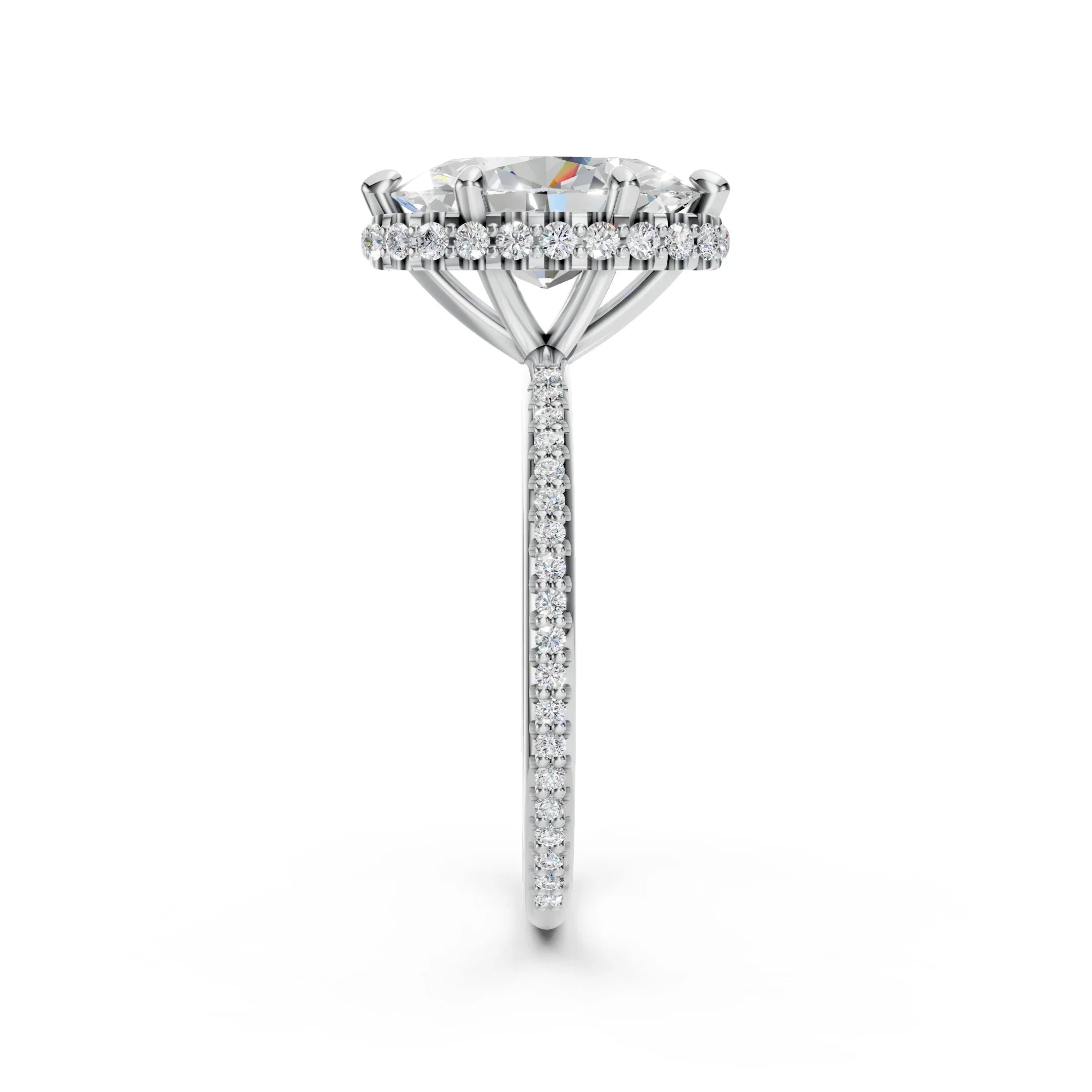 Side view of a diamond engagement ring with pavé band and halo setting