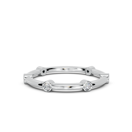 White gold band ring with bezel-set round diamonds, modern minimalist jewelry