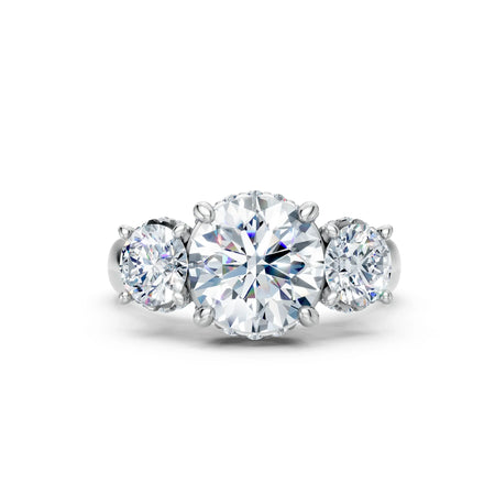 Three stone round diamond engagement ring in white gold setting