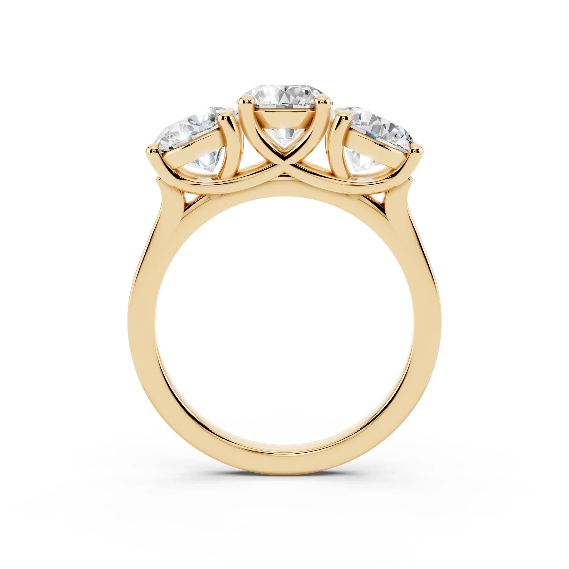 Three-stone yellow gold ring with round diamonds in a custom engagement ring setting