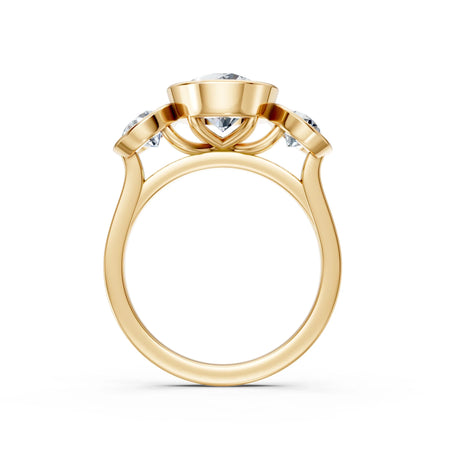 Three-stone gold engagement ring with round diamonds, side profile view