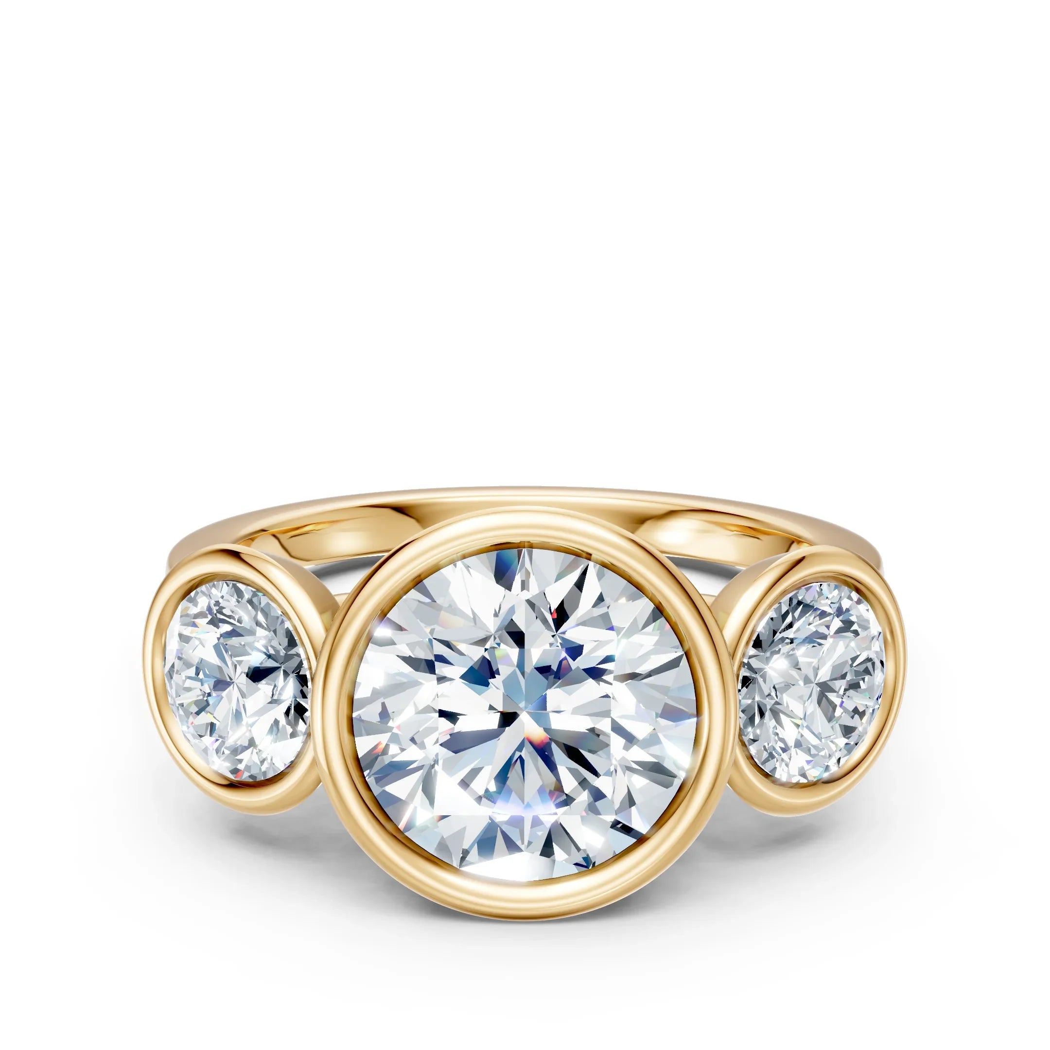 Three-stone round diamond engagement ring in yellow gold bezel setting