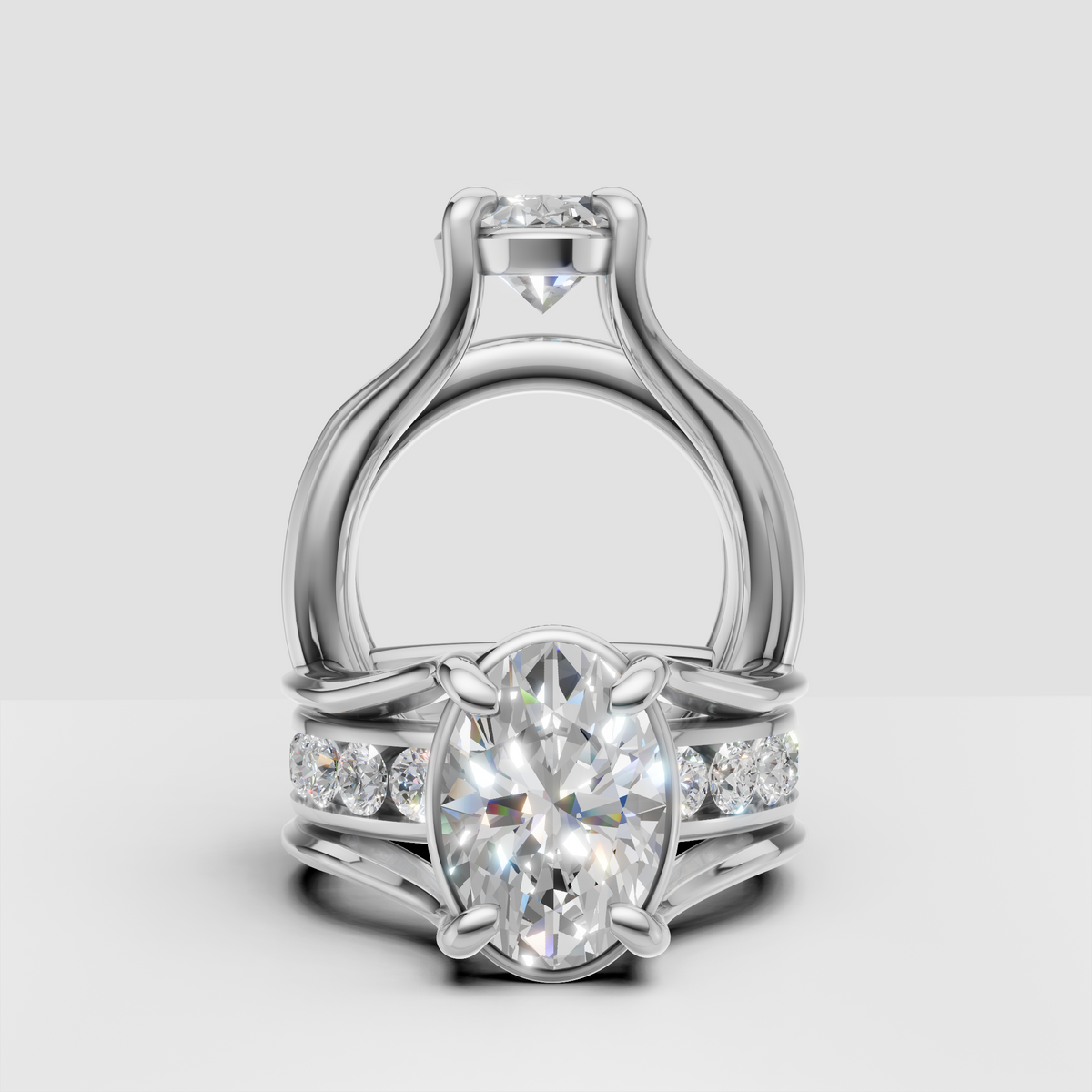 Oval diamond engagement ring with side stones in a unique white gold setting