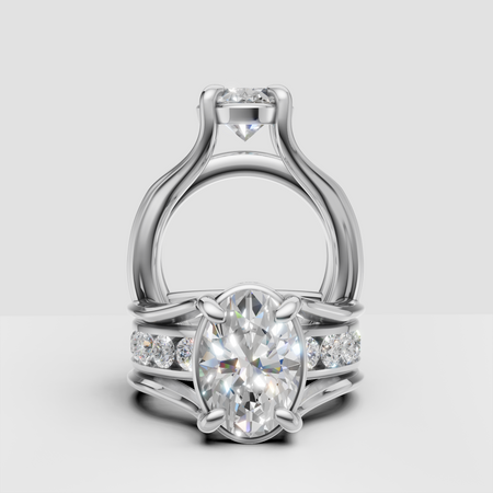 Oval diamond engagement ring with side stones in a unique white gold setting