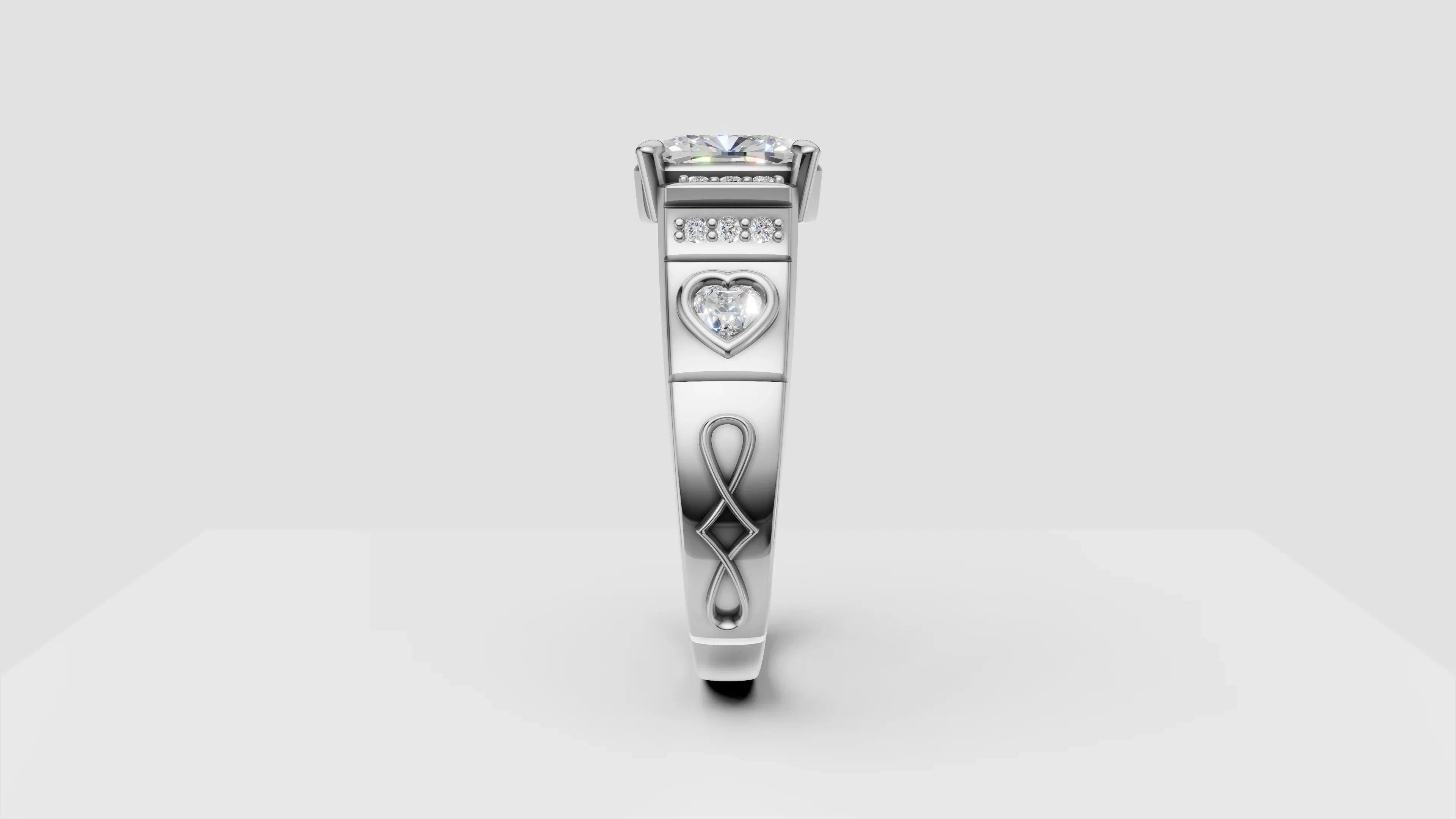 Custom white gold engagement ring with heart-shaped diamond and infinity symbol design