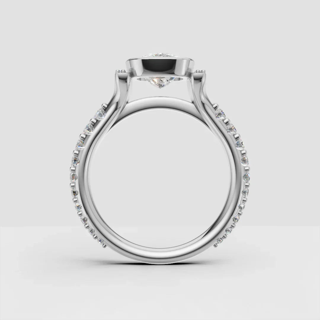 Custom white gold engagement ring with round diamond and pavé band