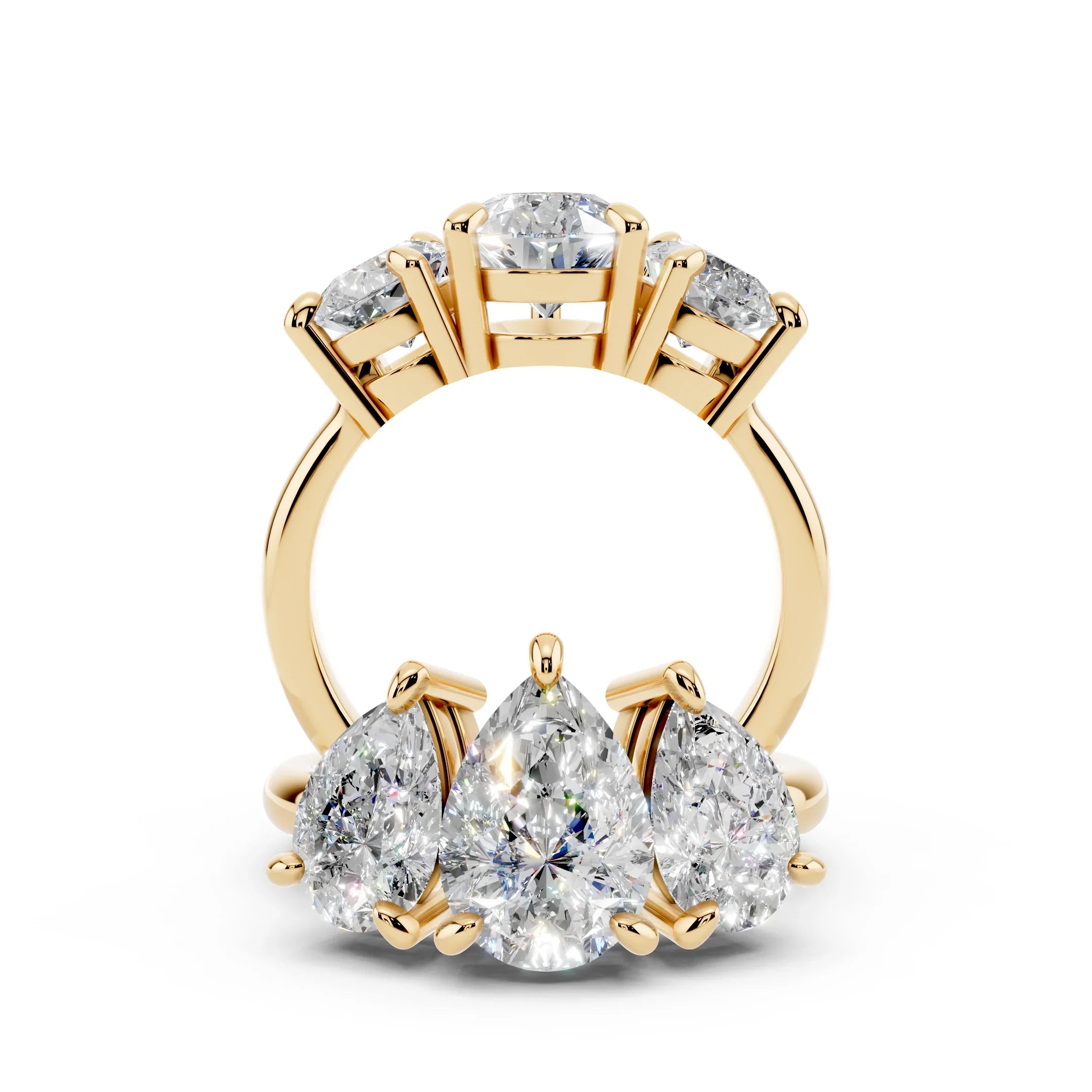 Yellow gold band with three pear-shaped diamonds in custom engagement ring setting