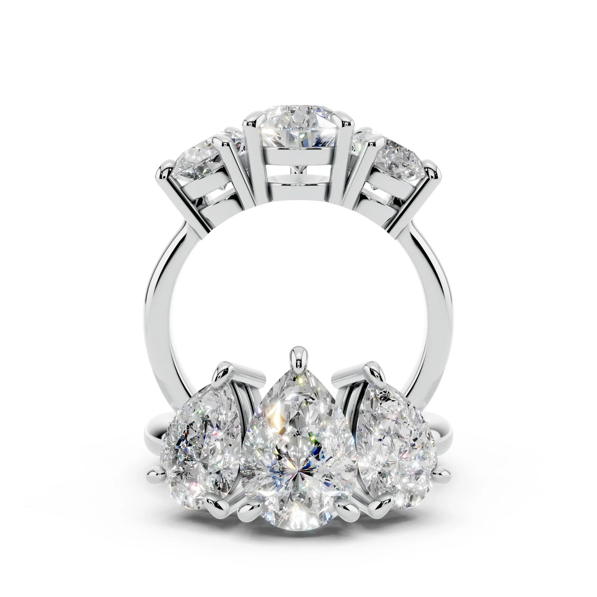 Platinum ring with pear-shaped and round diamonds in a custom engagement ring setting