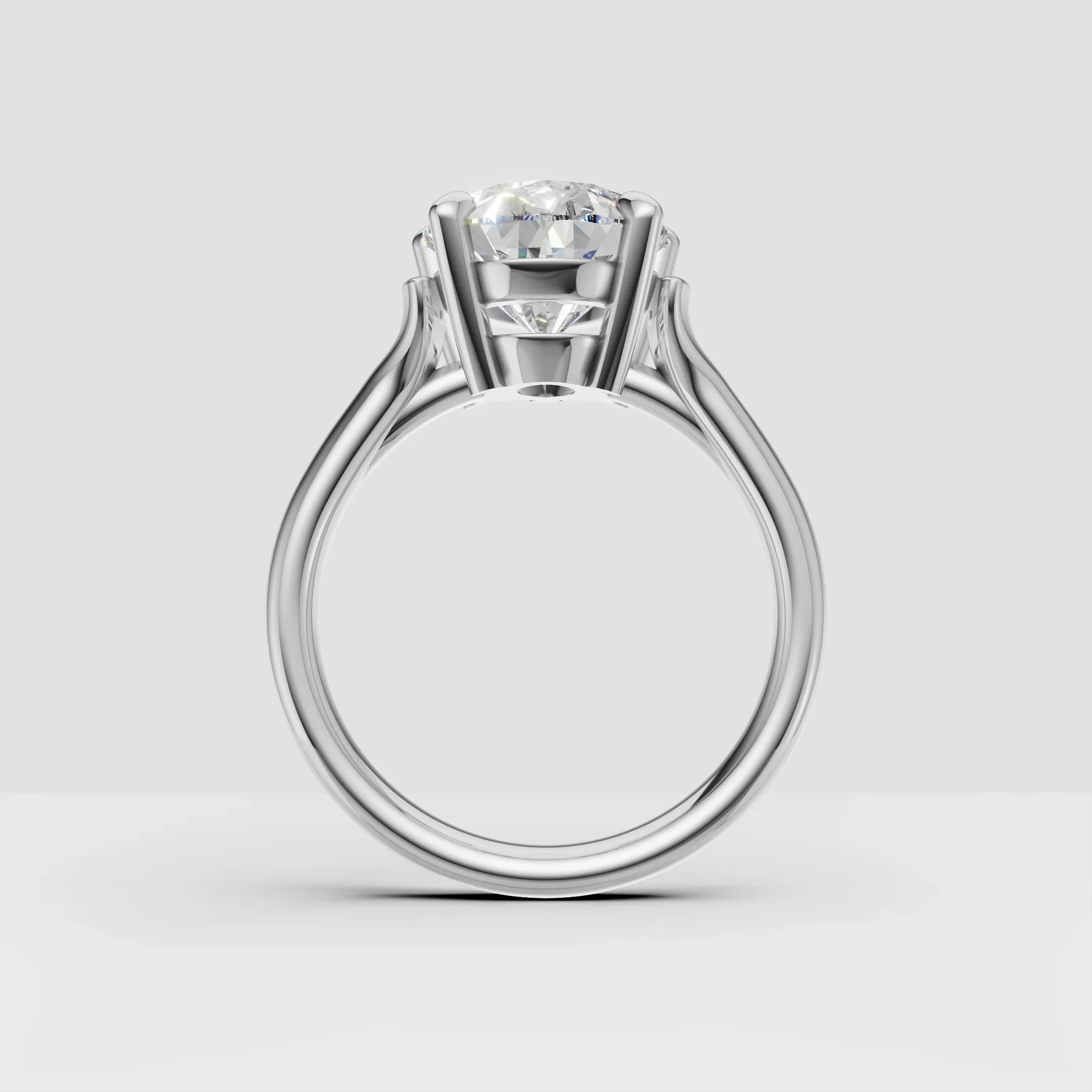 Platinum solitaire engagement ring with round brilliant-cut diamond in prong setting