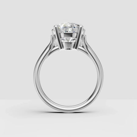 Platinum solitaire engagement ring with round brilliant-cut diamond in prong setting