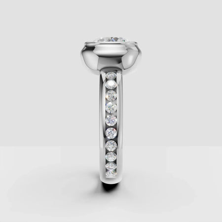 Side view of custom white gold engagement ring with round diamonds on band