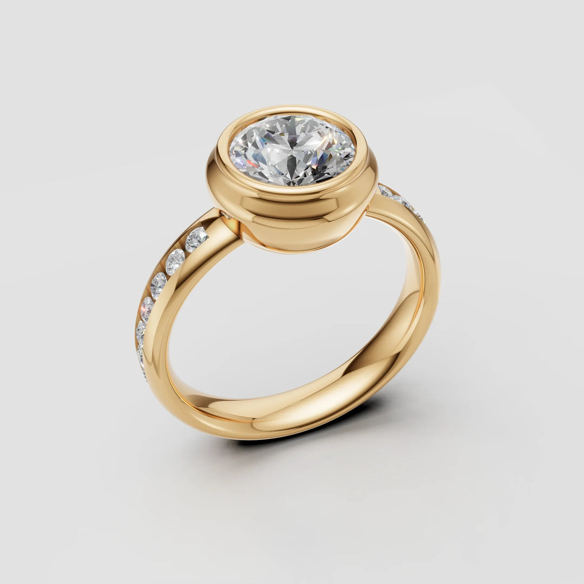Yellow gold engagement ring with bezel-set round diamond and pavé band